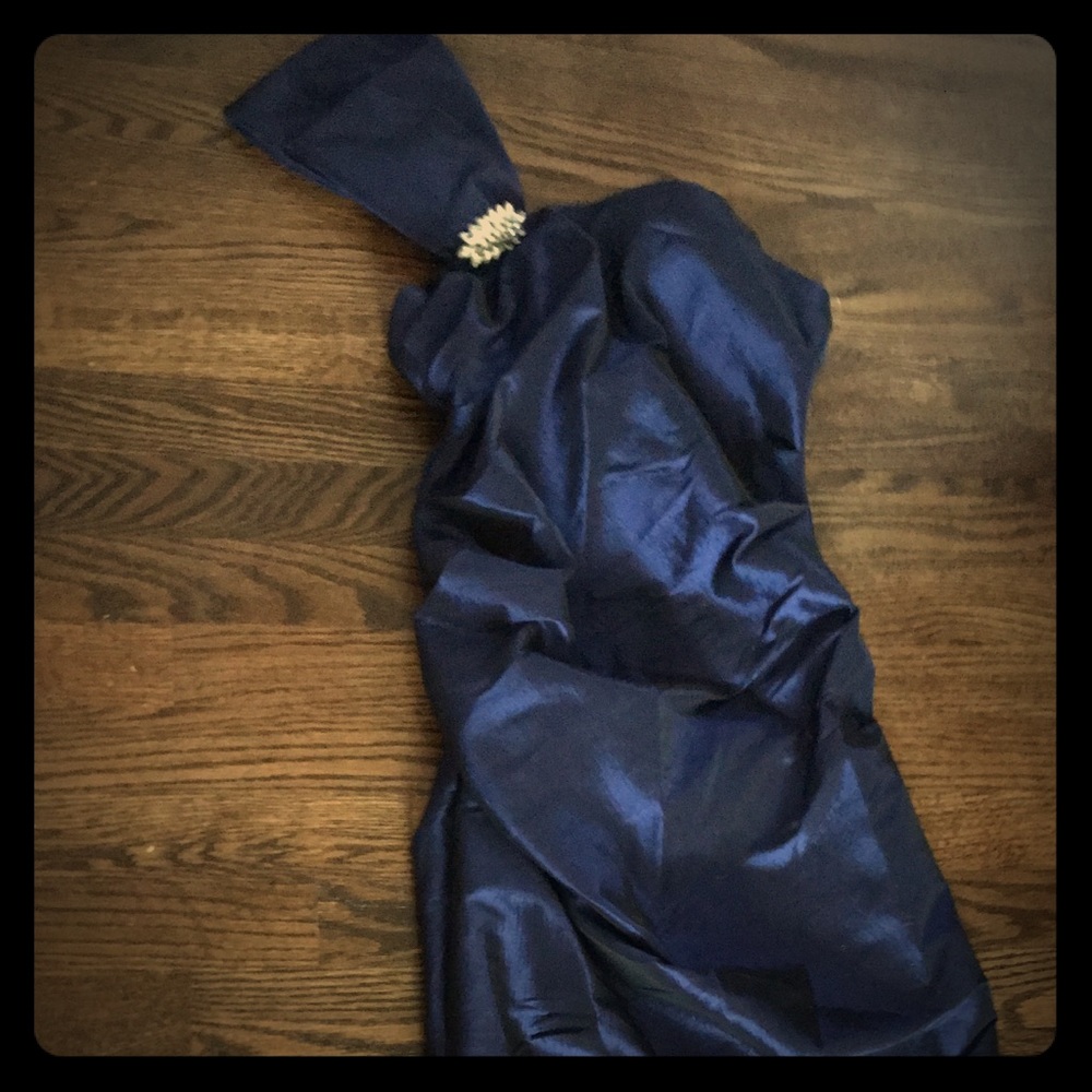 Formal full length navy gown with accent shoulder
